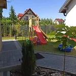 Pod Katalpami Hébergement de vacances Mikołajki